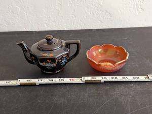 lot 611 image: Iridescent Orange Dish, and Tea Pot.