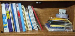 lot 634 image: Binders and Note Pads.