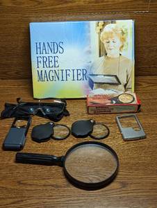 lot 637 image: (7) Magnifiers and Magnified Glasses.