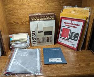 lot 650 image: Envelopes, TI-5130 Calculator, Blank Notes and Binder Sheets.
