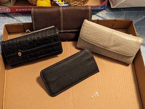 lot 697 image: (3) Wallets.