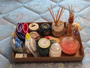lot 703 image: Candles and Aroma Diffusers.