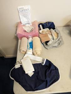 lot 748 image: Arm Sling, Cotton Rounds, Cold Pack, Head Positioner and more.