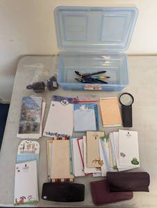 lot 751 image: Note Pads, Magnifying Glass, Charger Coords.