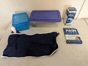 lot 755 image: Arm Sling, Pain Cakes, Ice Bag, and (2) Bins.