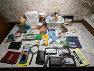 lot 766 image: Magnifying Glasses, Tape, Calculator, Paper Clips and more.