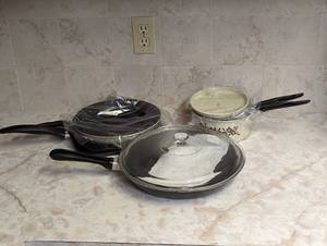 lot 802 image: Skillets and Pots.