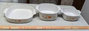 lot 808 image: (3) Wild Flower Corning Ware Casserole Dishes.