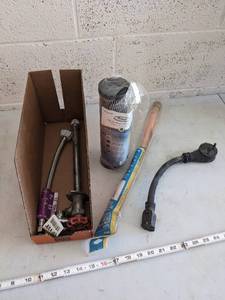 lot 1023 image: Plumbing  Whole House Filter  Generator Adaptor