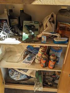 lot 1063 image: Ice Melt, Bar and Chain Oil, Plastic Wheels, Sprinkler, Brush and more.