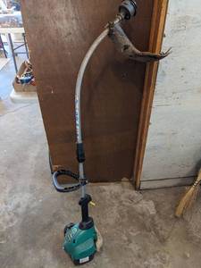 lot 1089 image: Feather Lite Weed Eater.