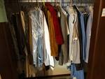 Contents of closet- Coats, jackets, pants, misc.