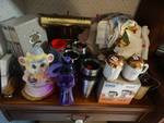 Lot of coffee mugs, cups, lamp, kitchen towels, misc.