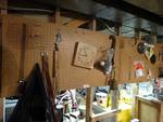 All contents on peg board/ clock/ golf balls/misc.