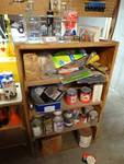 Wood shelf & contents- various sand paper, pvc fittings, paint, misc.