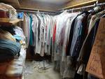 Lg lot of clothes. All clothes on shelf & hanging.
