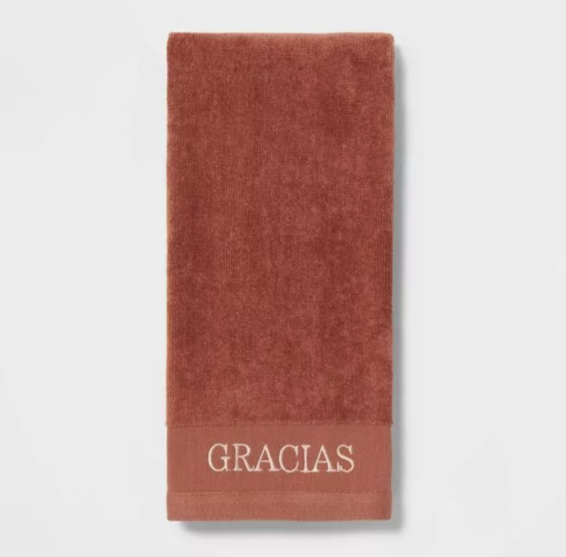 lot 100305 image: HAND TOWEL- 2 count of 25 x 15 Embroidered Gracias . RustWhite