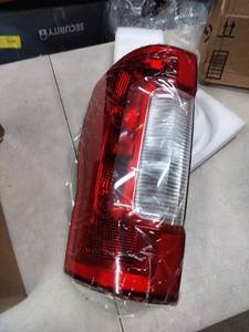 lot 5755 image: Left Side BrakeTail Light for Unknown Vehicle