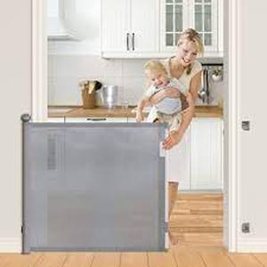 lot 1013 image: Multi Use Retractable Baby Gate Grey 54
