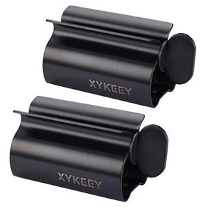 lot 24116 image: XYKEEY Toothpaste Tube Squeezer - Set of 2 Toothpaste Squeezer Rollers, Metal Toothpaste Tube Wringer Seat Holder Stand (Matt Black)