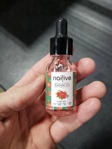lot 2603 image: Nailive Nail Cuticle Oil Jojoba Cutical Essence Nails Oils Heals Dry Cracked Rigid Cuticles Pomegranate Extraction with Natural Ingredients Vitamin E for Moisturizing Soothing Nourishing-0.5oz