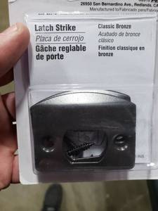 lot 2711 image: Prime-Line E 2516 Door Latch Strike Plate, Steel Construction, Classic Bronze Finish (2 Pack)