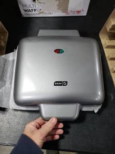 lot 2726 image: DASH Multi Mini Waffle Maker Four Mini Waffles, Perfect for Families and Individuals, 4 Inch Dual Non-stick Surfaces with Quick Release & Easy Clean - Graphite