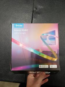 lot 2784 image: Govee 65.6ft RGBIC LED Strip Lights for Bedroom, Smart Alexa Compatible, DIY Multiple Colors on One Line, Color Changing , Music Sync, Festival Decoration, 2 Rolls of 32.8ft - Retail $76.14