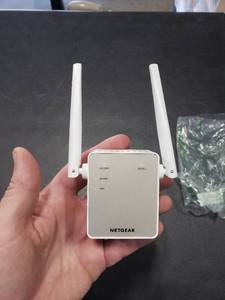 lot 2818 image: NETGEAR Wi-Fi Range Extender EX6120 - Coverage Up to 1500 Sq Ft and 25 Devices with AC1200 Dual Band Wireless Signal Booster & Repeater (Up to 1200Mbps Speed), and Compact Wall Plug Design, White