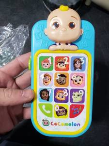 lot 2869 image: CoComelon JJs First Learning Toy Phone for Kids, Lights, Sounds, Music, Letters, Numbers, Colors, Shapes, and Weather, Officially Licensed Kids Toys for Ages 18 Month, Gifts and Presents by Just Play
