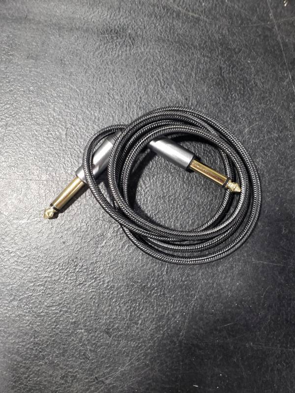 lot 3480 image: Jelly Tang 6.35mm Instrument Cable 3Ft,Silver Color Premium 6.35mm Mono Jack 14 TS Cable Unbalanced Guitar Patch CordsInstrument Cable Male to Male with Zinc Alloy Housing and Nylon Braid(3Ft1M)