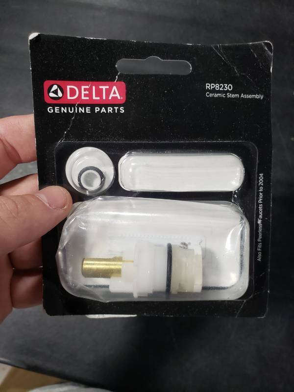lot 5314 image: Delta Faucet RP8230 Two Handle Ceramic Stem Assembly with Ceramic Seat and Spring