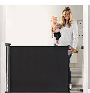 lot 14041 image: Retractable Baby Gate, Momcozy Extra Wide Mesh Baby Gates for Stairs, 41 Tall, Extends to 71 Wide, Black, Pet Dog Gate for Doorways, Stairs, Hallways, IndoorOutdoor