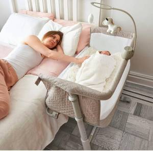 lot 14247 image: Cloud Baby Bedside Baby Bassinet, Best Bed Cribs for Infant Newborn, Portable Sleeper for Safer Co-Sleeping, Bed Crib Plus Hanging Figurine, Music, and Built-in Wheels - Girl Boy Unisex Retail $200