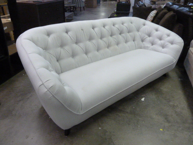 lot 239 image: GREY SOFA - HAS A COUPLE OF STAINS