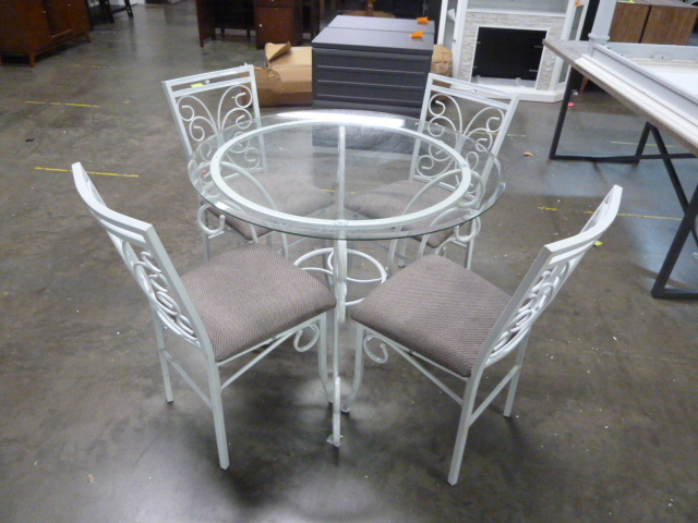 lot 214 image: METAL DINING TABLE WITH GLASS TOP AND FOUR CHAIRS - HAS RUST IN SPOTS