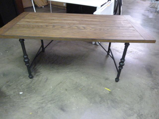 lot 212 image: LARGE WOOD DINING TABLE - HAS CRACK ON EDGEUNDER TABLE