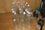 Lot of 15 Glass Decanter Bottlew w/ Stoppers and Metal Clips and 4 Glass Coffee Pots