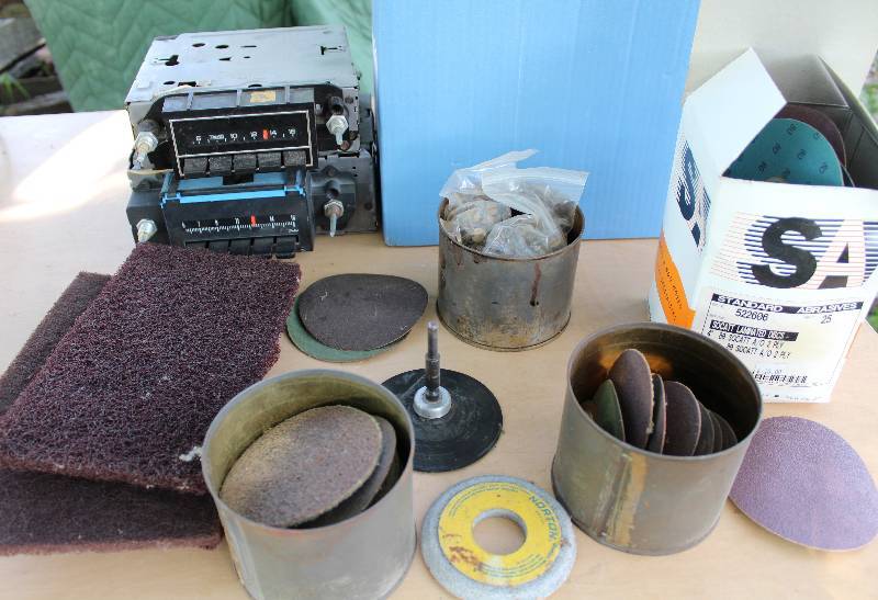lot 2186 image: Lot of Sanding Discs, Abrasives and 2 vintage car radios (push button style) COOL