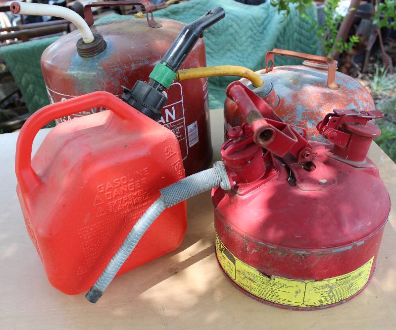 lot 2213 image: Lot of 4 - Portable Gas Cans - See photos These are handy