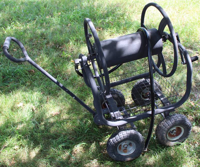 lot 2241 image: Wagon Style HOSE REEL - Four Wheels w basket below - COOL