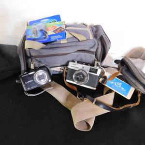 lot 5258 image: Vintage Olympus 35 RC Camera & a Panasonic Lumix.