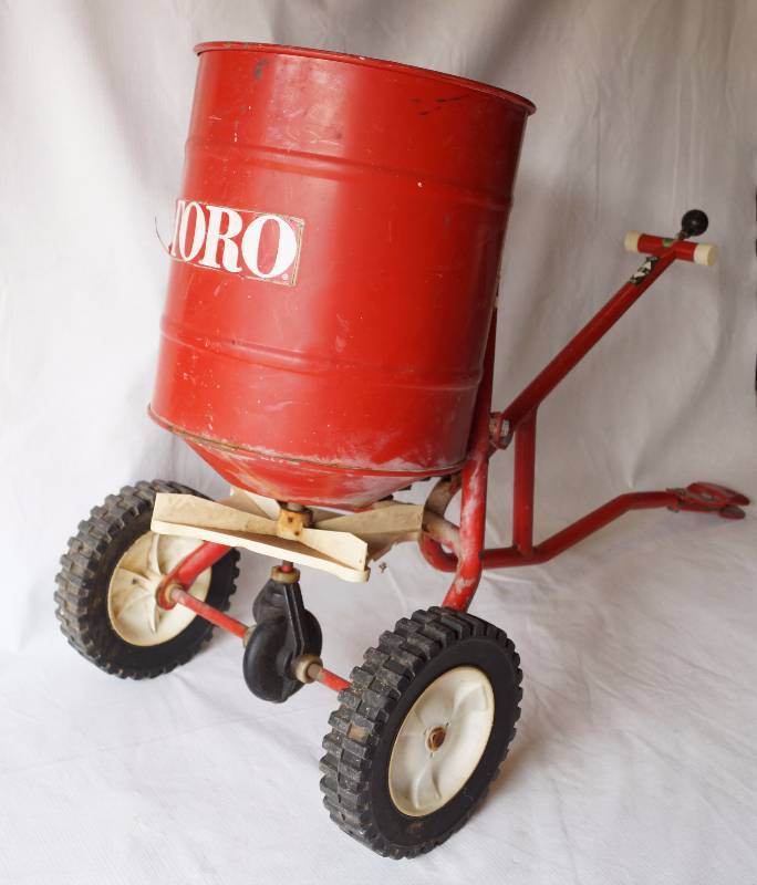 lot 6010 image: Toro Lawn Spreader Attachment for your lawn tractor - Needs WD-40 on stuck wheel