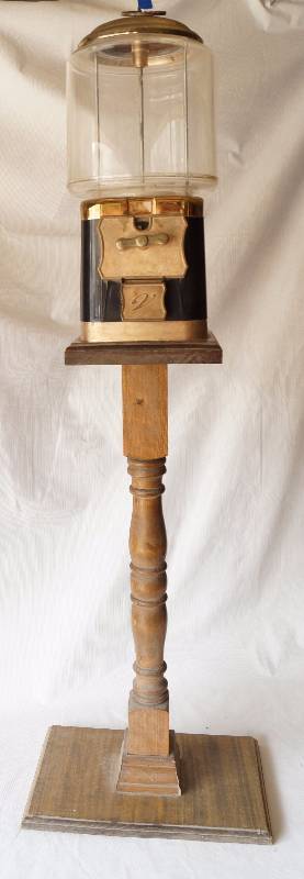 lot 6013 image: Nostalgic Look Bubble Gum Machine on wooden stand - Works With Key Over 43 tall