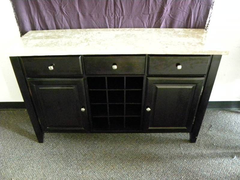 lot 7117 image: 34 T, 56 W, 18 D. Looks Like Sqare Cut Pegasus Granite Top.