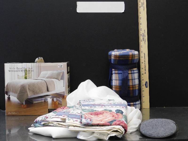 lot 9001 image: Comfortable Grouping of Useful Fabrics.  Wooden Bed Lifts  Sliders.