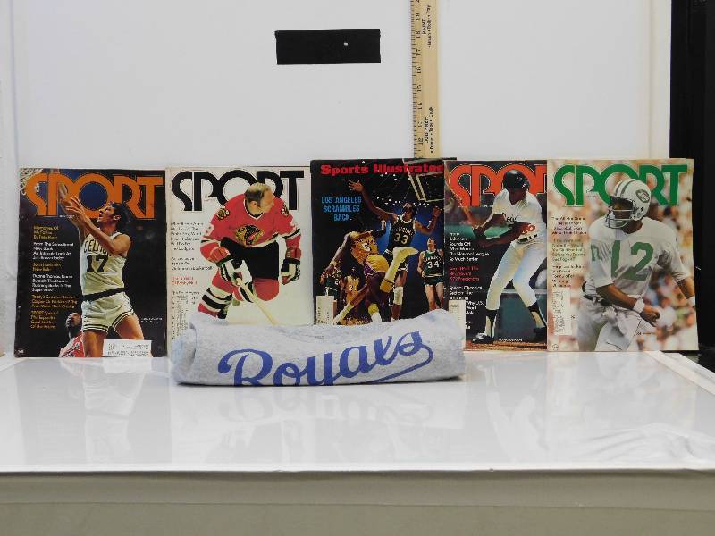 lot 9004 image: Just shy of Antique, Sports Magazines (5)  2XL Royals T-Shirt.