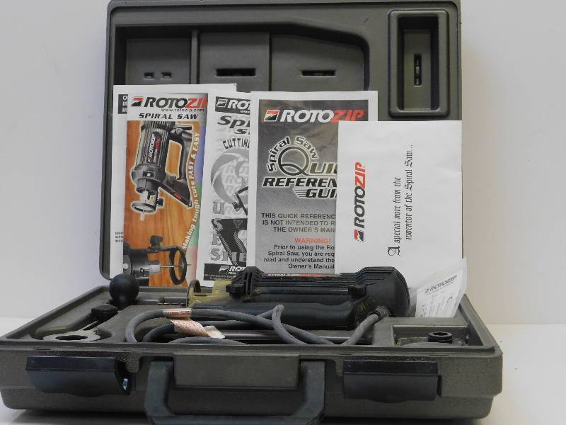 lot 9054 image: Roto Zip Spiral Saw w Case Set. See Images for Exact Specs.