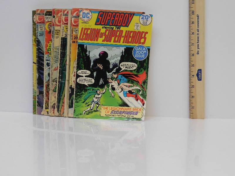lot 9063 image: 10 Vintage Antique Comic Books. Anything from Fighting Marines to Ghost Rider.