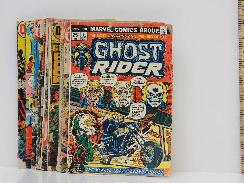 lot 9064 image: 10 Vintage Antique Comic Books. Anything from Fighting Marines to Ghost Rider.
